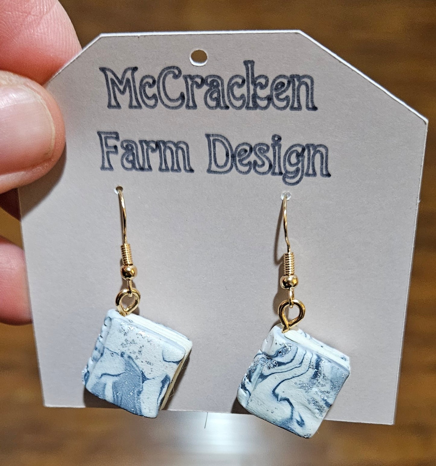 Grey & white marbled books