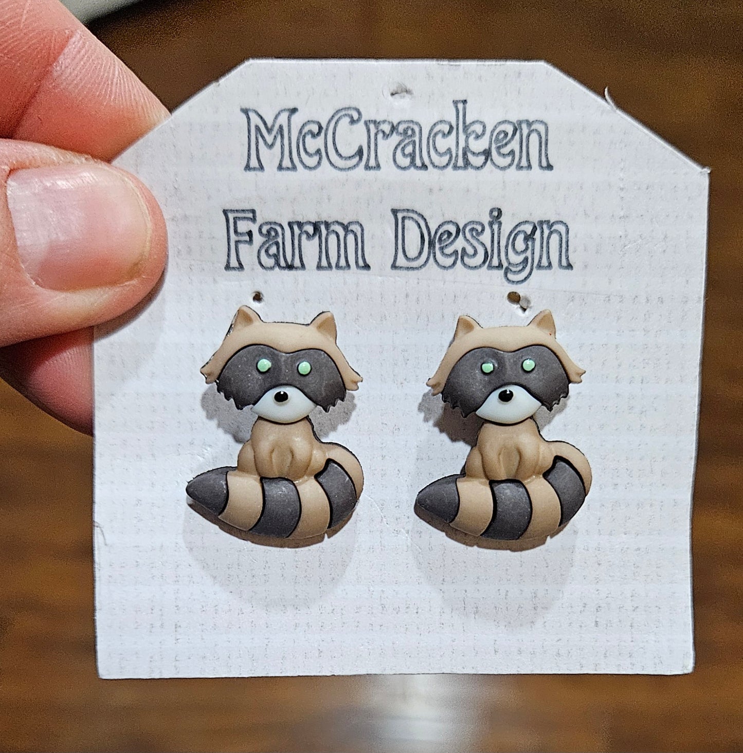 Raccoon button earrings