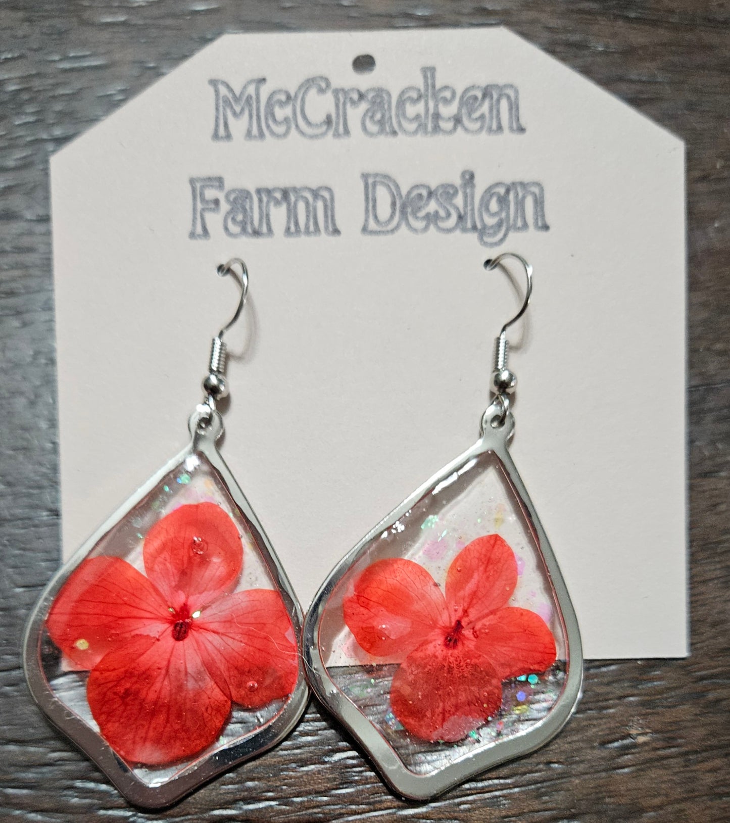 Red flowers in teardrop frames