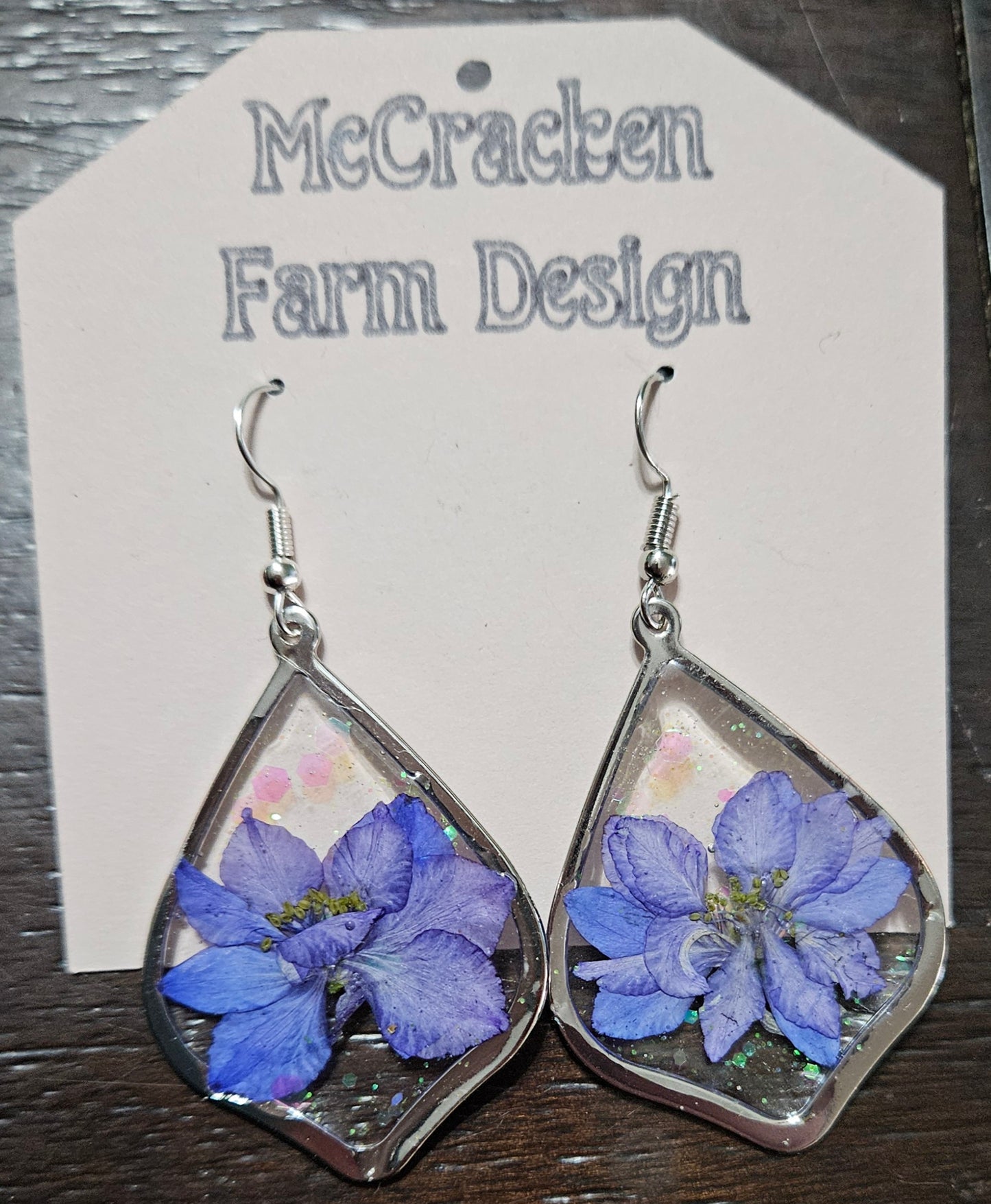 Blue flowers in teardrop frame