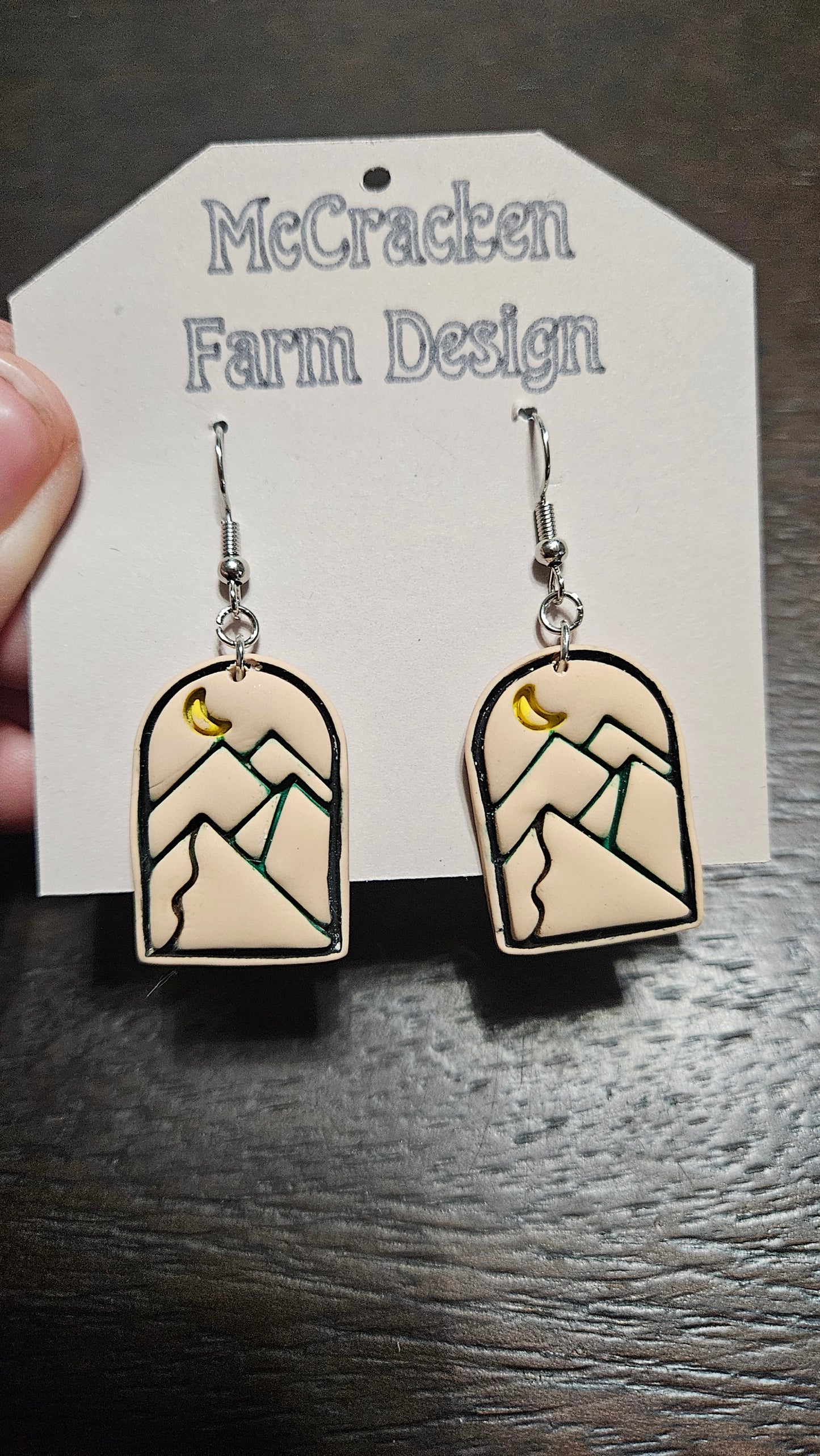 Embossed colored mountain scene