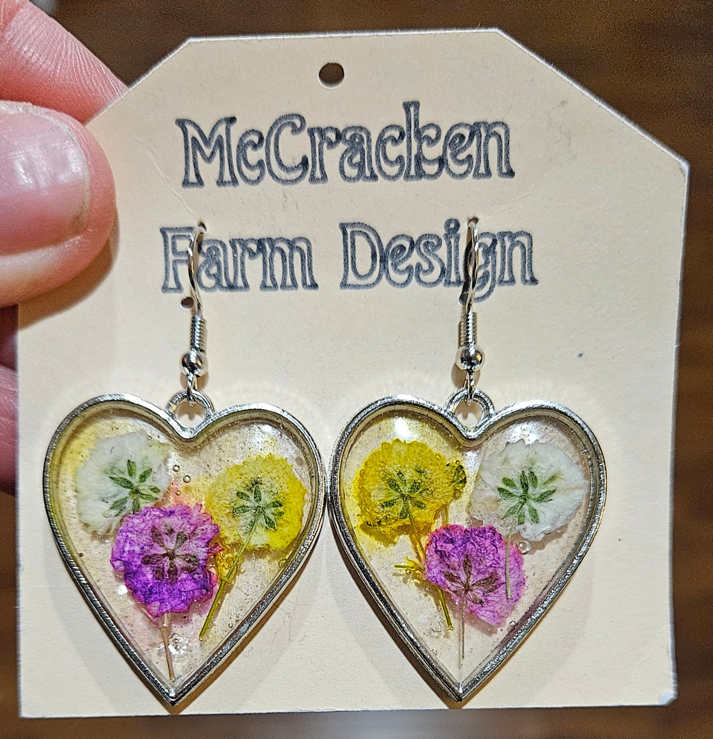 Heart framed flower trio in resin