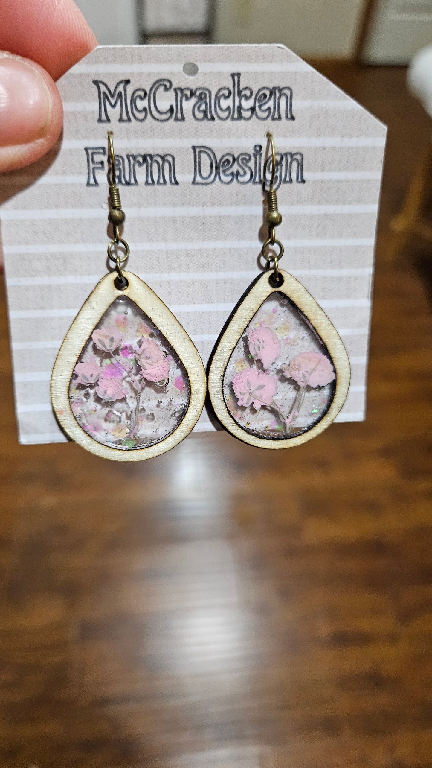 Wooden framed pink flowers in resin