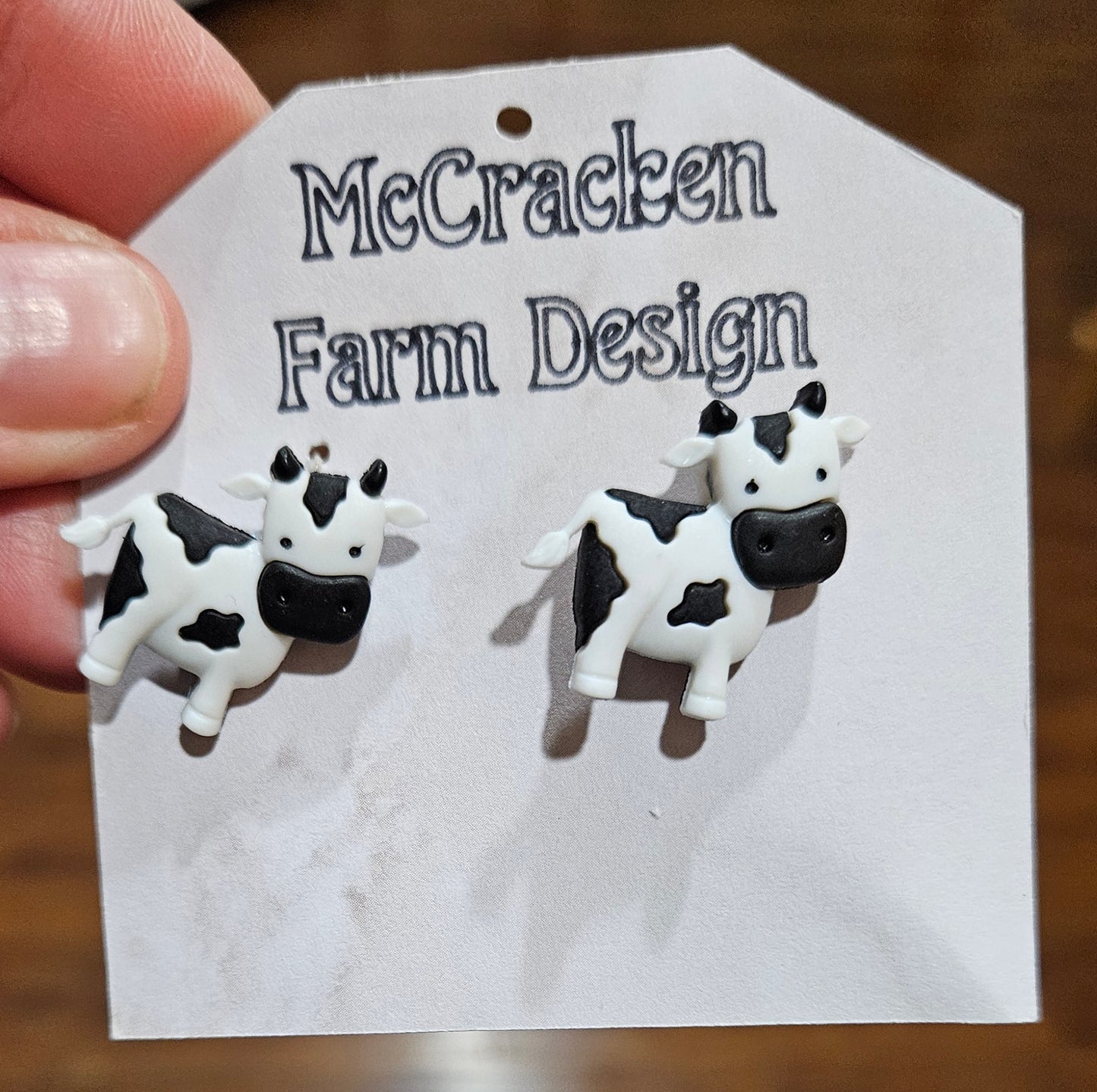 Cow button earrings