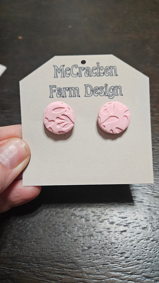 Pink embossed studs
