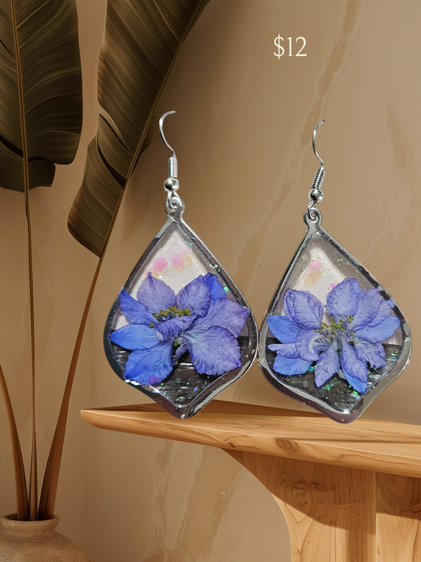 Blue flowers in teardrop frame