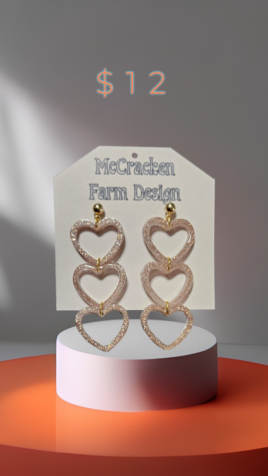 Triple golden glitter heart dangles